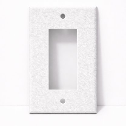 Plaque d'interrupteur avec un fini ondulé